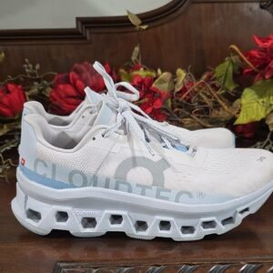 On Running Athletic Shoes in White and Light Blue